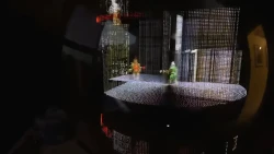  It's like a glimpse into the future when you see Doom played on a volumetric display that looks like a hologram.